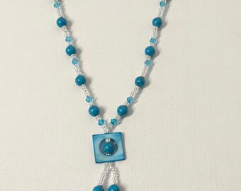 A turquoise blue necklace