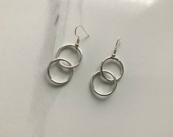 Silver linked hoop. Earrings