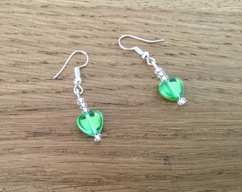 Green glass heart dangle earrings