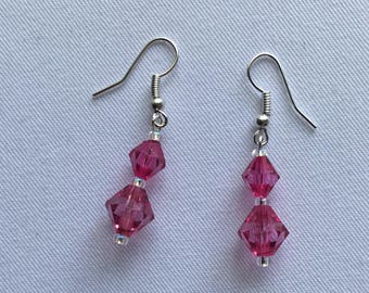Bright pink beaded earrings