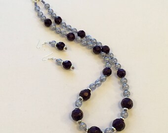 Purple beaded necklace with matching earrings