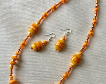 Orange beaded necklace and earring set