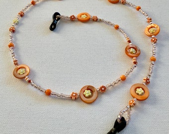 Orange beaded spectacle chain