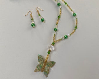 Green Beaded Necklace with a Butterfly Pendant and Earrings