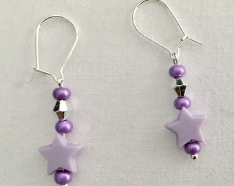 Purple star bead dangly earrings