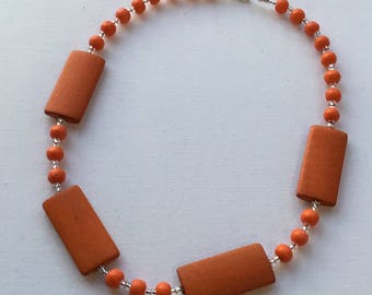 Bright orange choker necklace