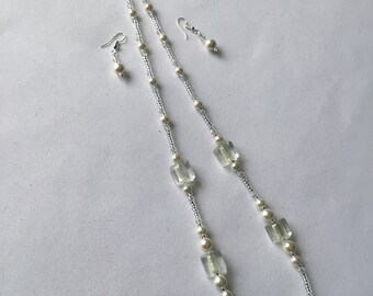 Crystal and pearl necklace And earrings