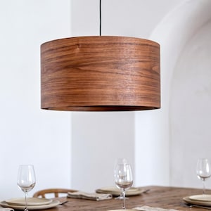 Wood pendant light made of walnut wood perfect for your dining room, kitchen island or living room. The right choice of modern chandelier will give your space the aura you desire