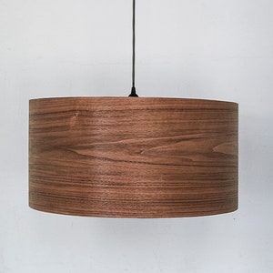 Modern ceiling light made of walnut wood perfect for your bedroom or living room. The right choice of wooden lampshade will give your space the aura you desire