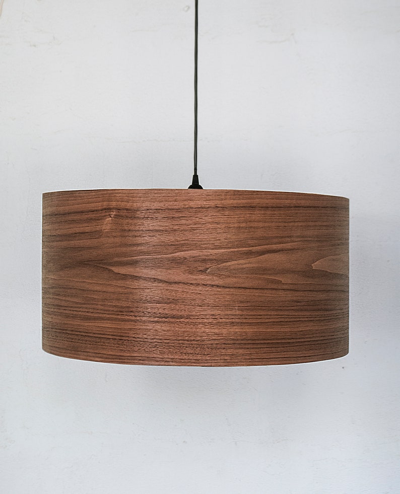 Modern ceiling light made of walnut wood perfect for your bedroom or living room. The right choice of wooden lampshade will give your space the aura you desire