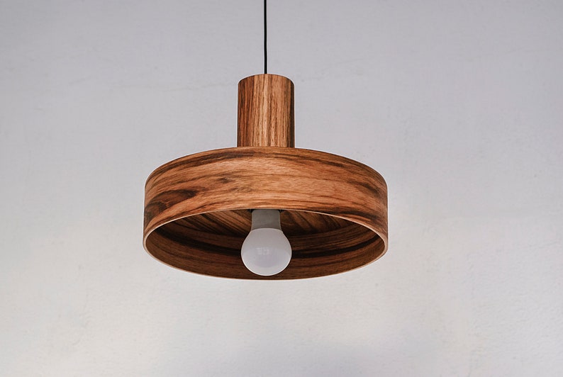 Modern ceiling light made of mango wood perfect for your kitchen or dining room. The right choice of wooden lampshade will give your space the aura you desire