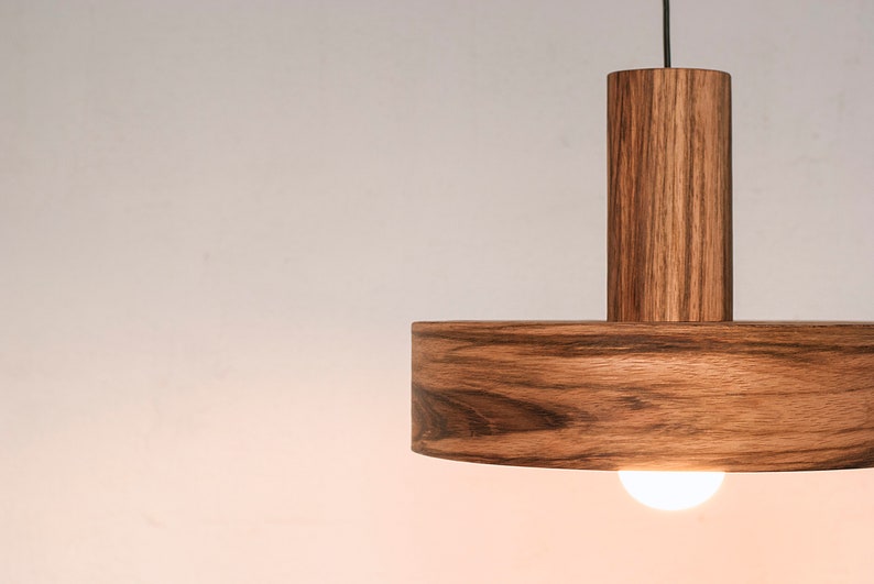 Wood light fixture made of mango wood perfect for your kitchen or dining room. The right choice of wooden pendant light will give your space the aura you desire