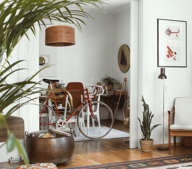 Wood pendant light made of walnut wood perfect for your bedroom or living room. The right choice of modern chandelier will give your space the aura you desire