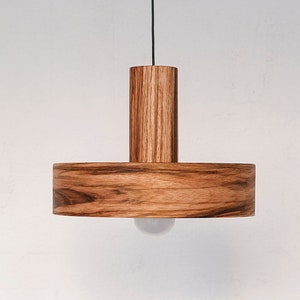 Wood pendant light made of mango wood perfect for your kitchen or dining room. The right choice of modern chandelier will give your space the aura you desire
