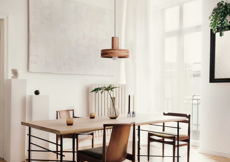 Wood pendant light made of mango wood perfect for your kitchen or dining room. The right choice of modern chandelier will give your space the aura you desire