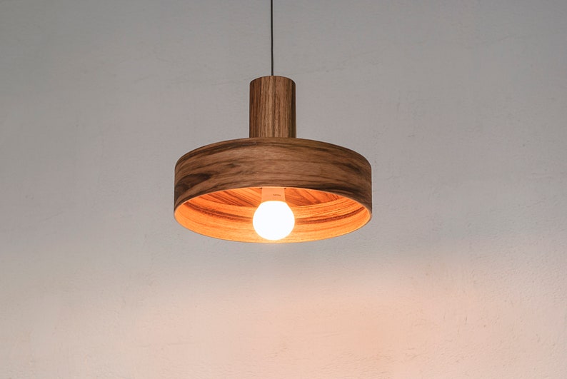 Wood light fixture made of mango wood perfect for your kitchen or dining room. The right choice of wooden pendant light will give your space the aura you desire