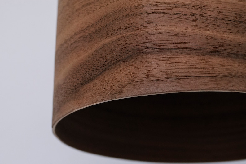 Wood pendant light made of walnut wood perfect for your kitchen or dining room. The right choice of modern chandelier will give your space the aura you desire