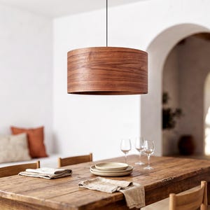 Wood pendant light made of walnut wood perfect for your dining room, kitchen island or living room. The right choice of modern chandelier will give your space the aura you desire