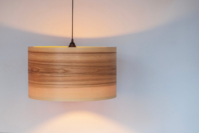 Wood light fixture made of olive wood perfect for your bedroom or living room. The right choice of wooden pendant light will give your space the aura you desire