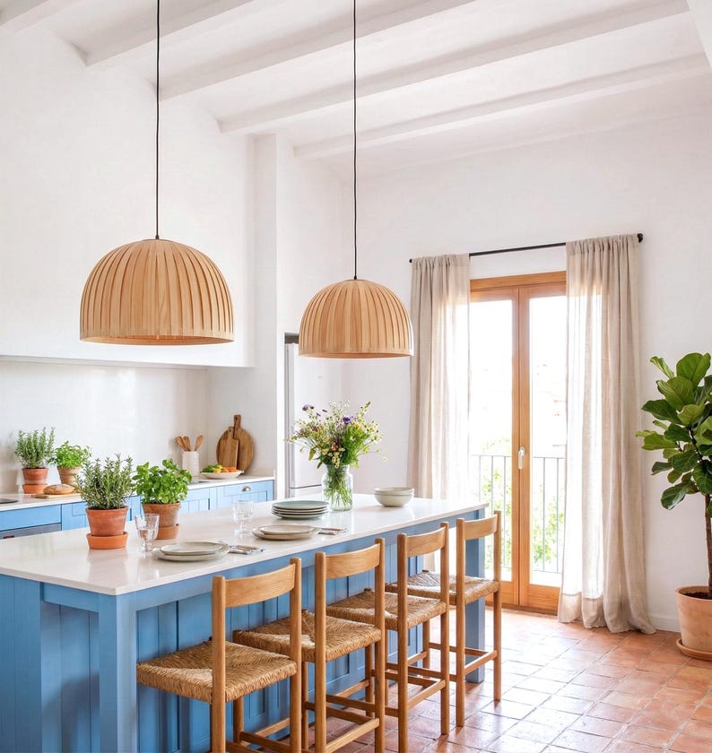 Maple wood pendant light Bell Maple Scandinavian ceiling lamp hanging above dining table with warm glow