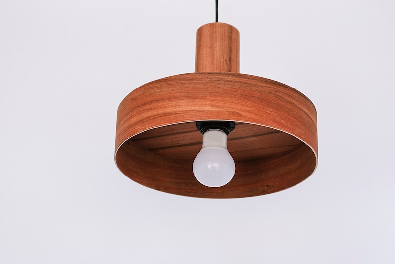 Modern ceiling light made of apple chile wood perfect for your kitchen or dining room. Ideal for spot light. The right choice of wooden lampshade will give your space the aura you desire