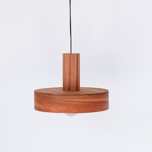 Modern ceiling light made of apple chile wood perfect for your kitchen or dining room. Ideal for spot light. The right choice of wooden lampshade will give your space the aura you desire