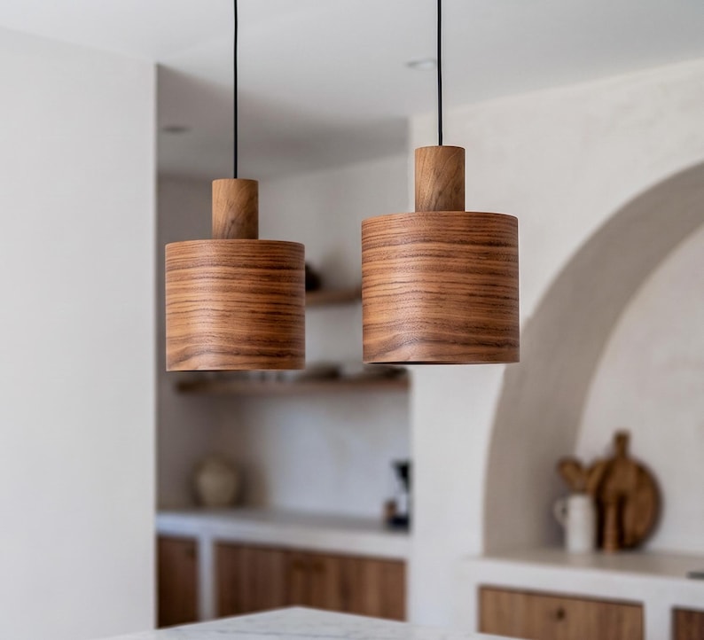 Wood pendant light made of walnut wood perfect for your kitchen or dining room. The right choice of modern chandelier will give your space the aura you desire