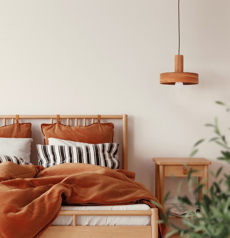 Wood pendant light made of apple chile wood perfect for your bedroom or living room. Ideal for spot light. The right choice of modern chandelier will give your space the aura you desire