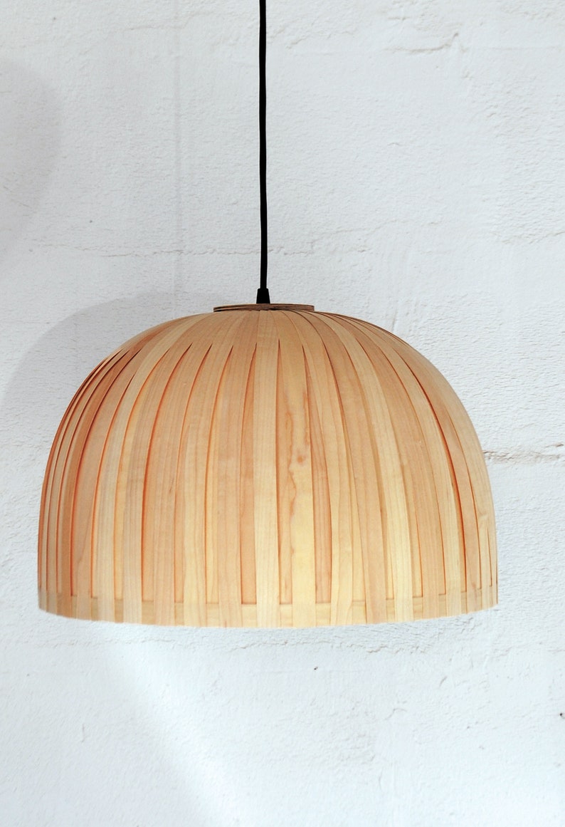 Minimal maple wood hanging lamp shade showing natural wood grain texture