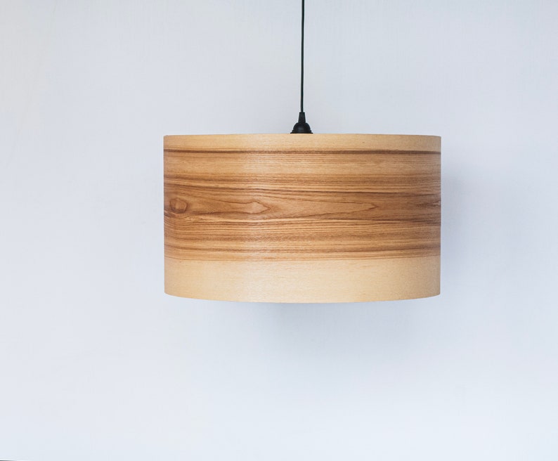 Wood light fixture made of olive wood perfect for your bedroom or living room. The right choice of wooden pendant light will give your space the aura you desire
