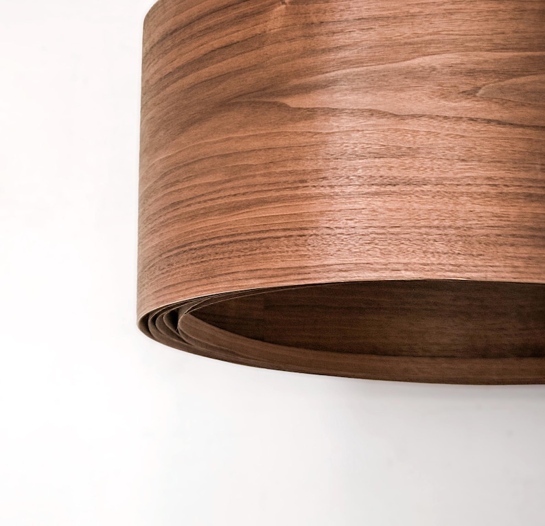 Wood pendant light made of walnut wood perfect for your bedroom or living room. The right choice of modern chandelier will give your space the aura you desire