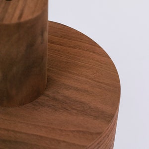 Wood pendant light made of walnut wood perfect for your kitchen or dining room. The right choice of modern chandelier will give your space the aura you desire