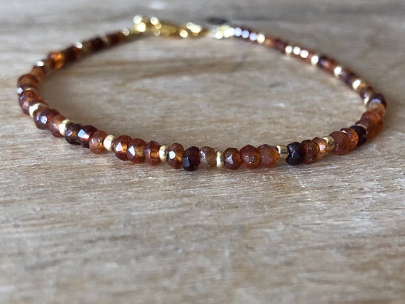 Cinnamon stone Orange Hessonite Garnet Bracelet Sacral chakra bracelet Reddish brown gemstone January birthstone Dark orange /& gold