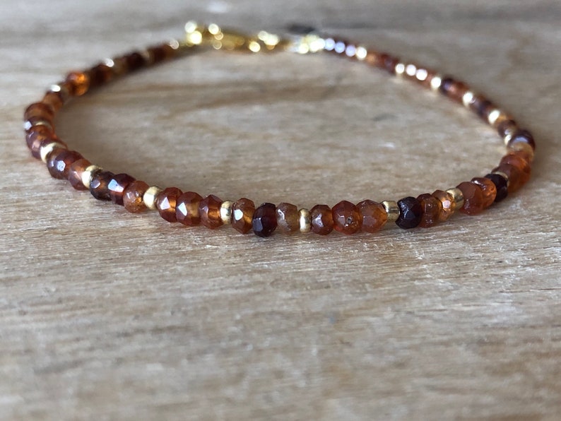 Cinnamon stone Orange Hessonite Garnet Bracelet Sacral chakra bracelet Reddish brown gemstone January birthstone Dark orange /& gold