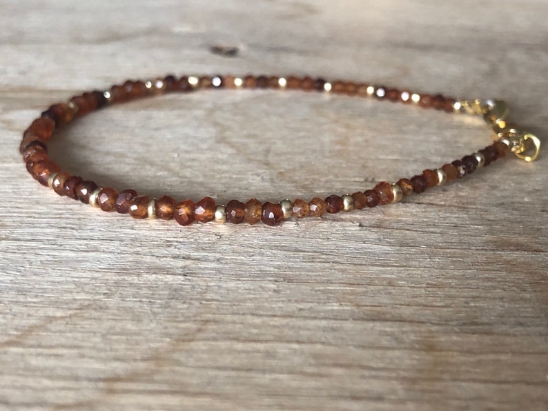 Cinnamon stone Orange Hessonite Garnet Bracelet Sacral chakra bracelet Reddish brown gemstone January birthstone Dark orange /& gold