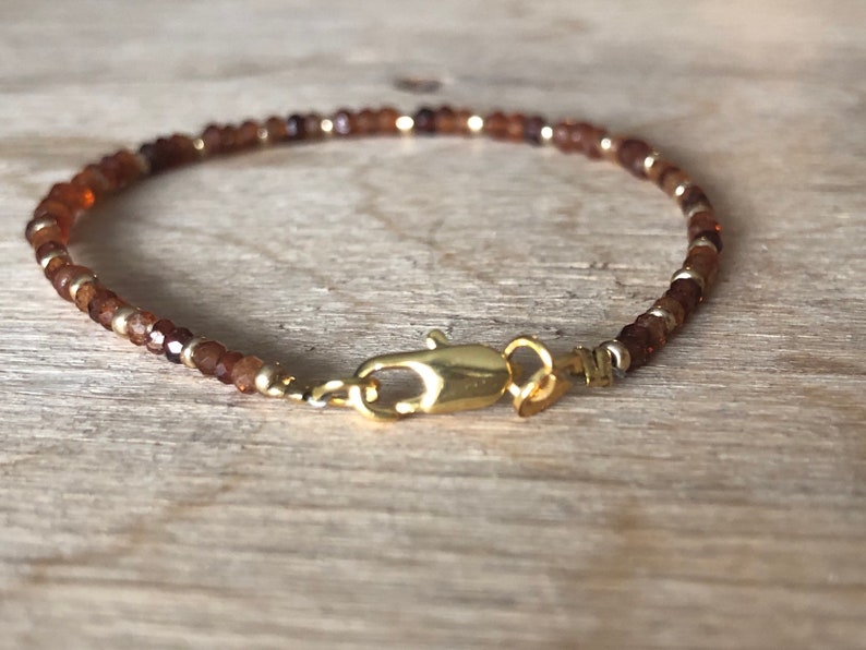 Cinnamon stone Orange Hessonite Garnet Bracelet Sacral chakra bracelet Reddish brown gemstone January birthstone Dark orange /& gold