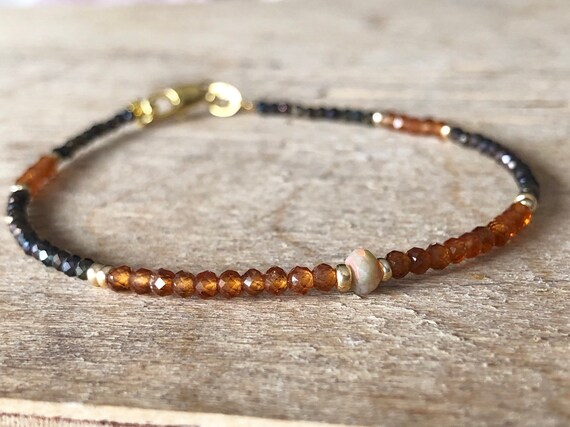 Cinnamon stone Orange Hessonite Garnet Bracelet Sacral chakra bracelet Reddish brown gemstone January birthstone Dark orange /& gold