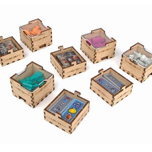 Organizer for Golem + Free Dice Tower. Needs base game box to be placed in. This Storage insert is an awesome hobby gift idea for game geek. Wooden laser cut accessory is perfect addition to board game party. Only trays without any components.