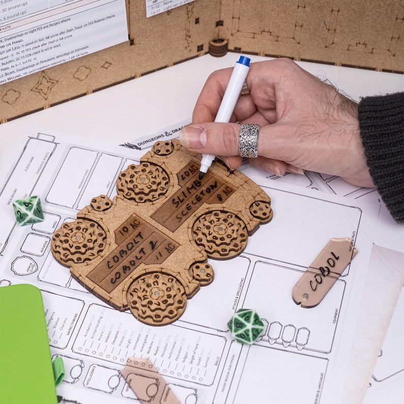 Dragon-themed DM screen with dual dice towers, initiative trackers, magnetic panels for notes, and storage compartments. Foldable for easy transport, it keeps your notes hidden, streamlines gameplay, making it perfect for D&D and other RPGs.