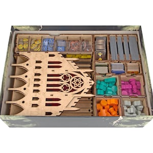 Organizer for Golem + Free Dice Tower. Needs base game box to be placed in. This Storage insert is an awesome hobby gift idea for game geek. Wooden laser cut accessory is perfect addition to board game party. Only trays without any components.