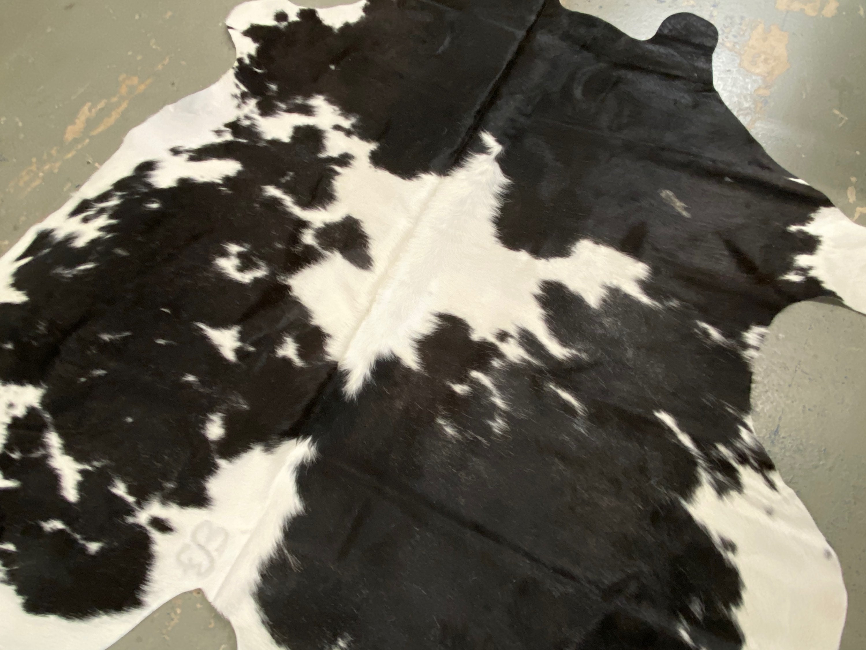 Argentina Cowhide Rug Size 5’6”x 6’9” by Cowhide Texas Store Inc