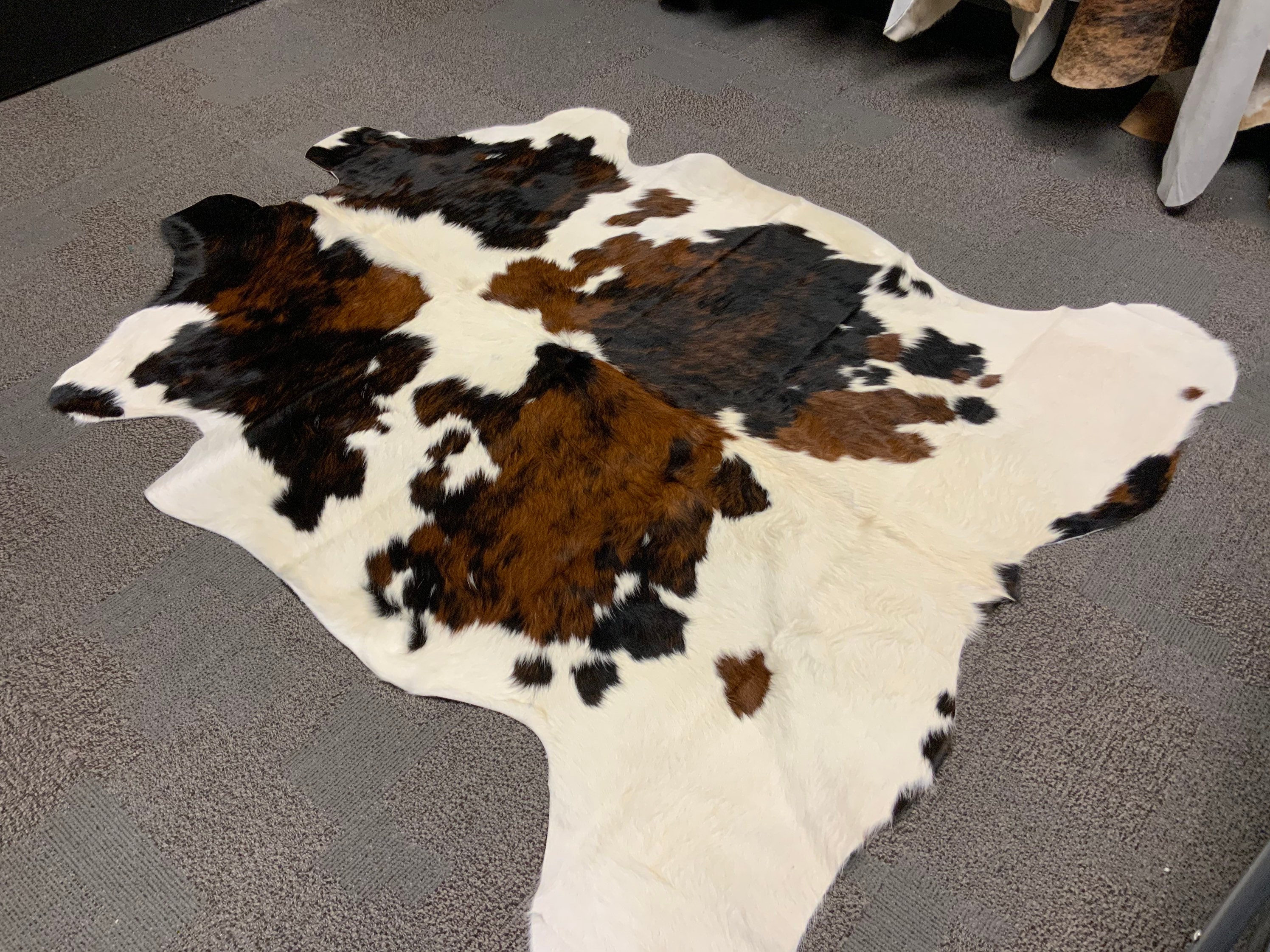 Natural Tri Color Cowhide Rug Size 69 X 75 By Cowhide Texas Store Inc natural-tri-color-cowhide-rug-size-69-x-75-by-cowhide-texas-store-inc