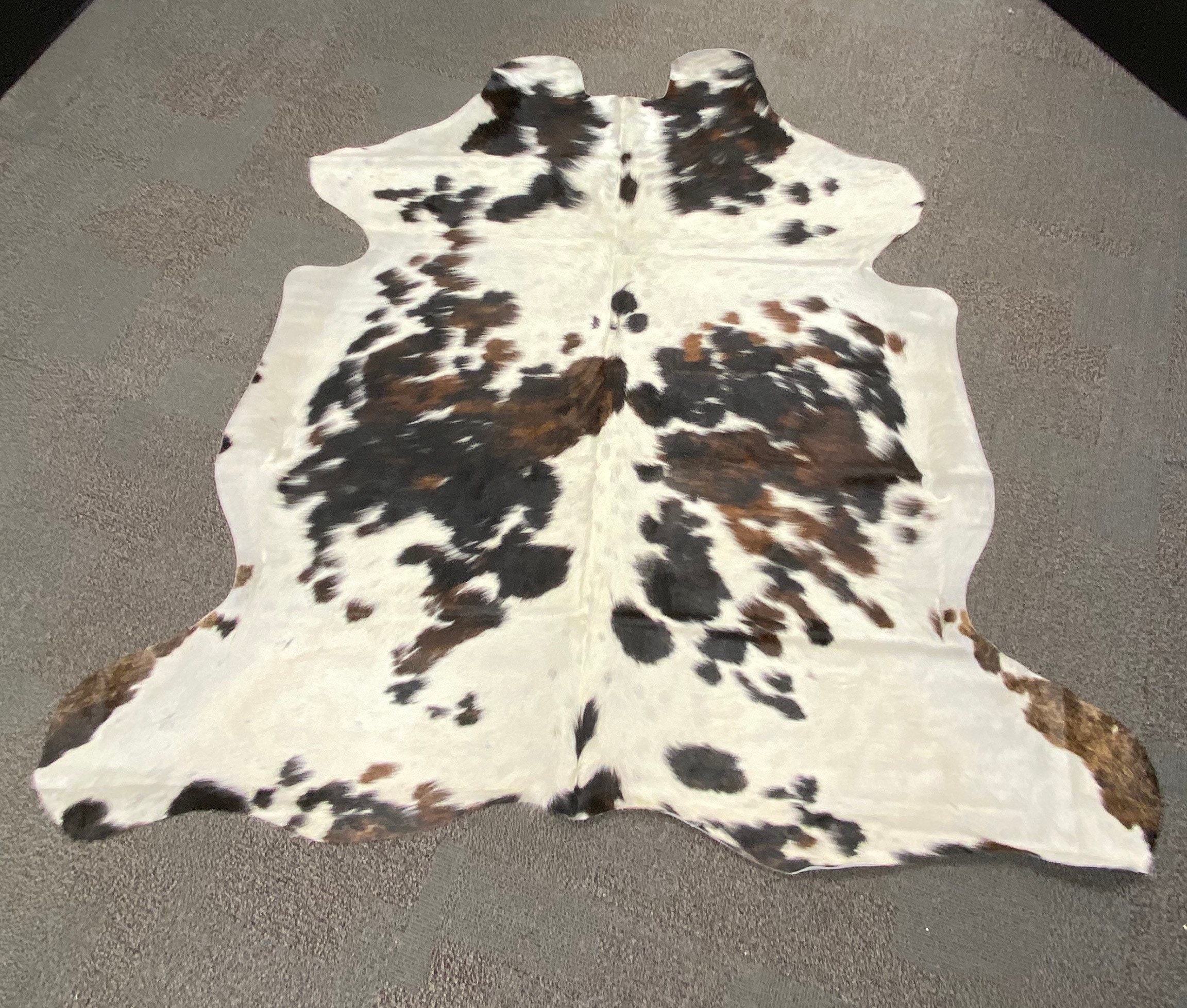 Natural Tri Color Cowhide Rug Size 69” x 75” by Cowhide Texas Store Inc. Actual Rug you will