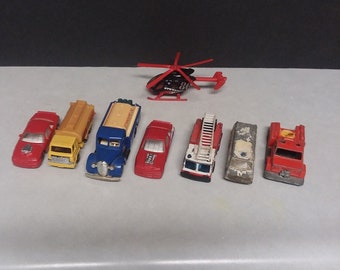 4 Matchbox Diecast Cars and 4 assorted Automobiles