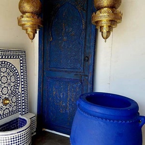 Majorelle blue door. Handmade moroccan blue geometric carved wooden door for bedroom or bathroom moorish andalusian alcazar palace door
