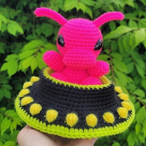 Neon Pink Alien in Spaceship