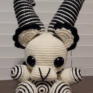 Crochet ivory and black hypnotic goat doll