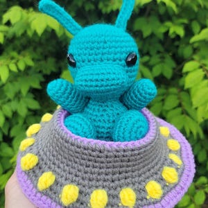 Teal Alien in Spaceship