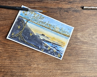 Tranquil Seascape mini art original watercolour "the Golden Hour" birds fly over a distant forest by a calming rocky river, 3.75 x 6 "