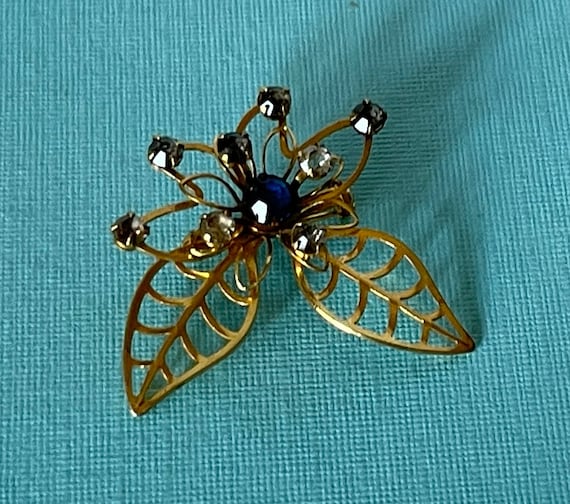 Vintage flower brooch, blue rhinestone flower pin… - image 1